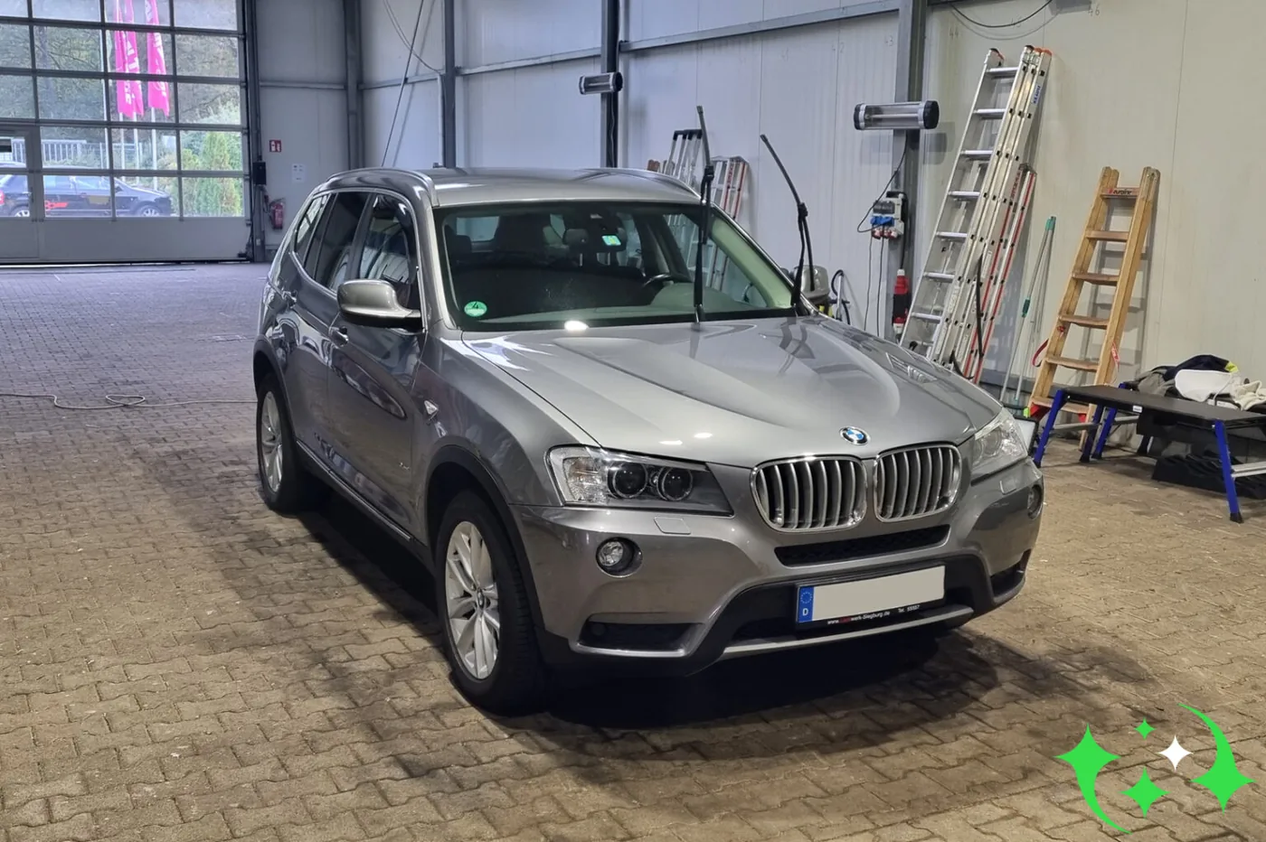 BMW X3 nach der Aufbereitung in der Versiegelungshalle